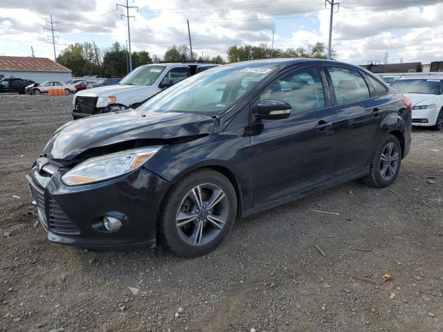 Image 1 of 2014 FORD FOCUS SE 2014 with VIN 1FADP3F20EL142884