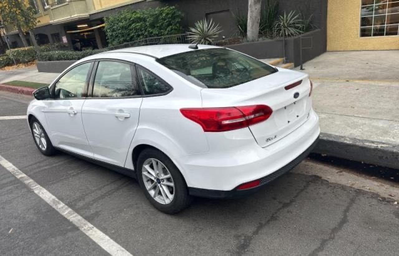 Image 3 of 2018 FORD FOCUS SE 2018 with VIN 1FADP3FE8JL293279