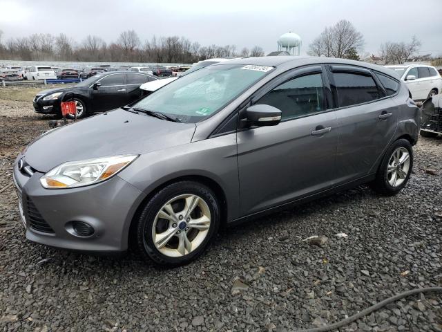 Image 1 of 2014 FORD FOCUS SE 2014 with VIN 1FADP3K21EL457344