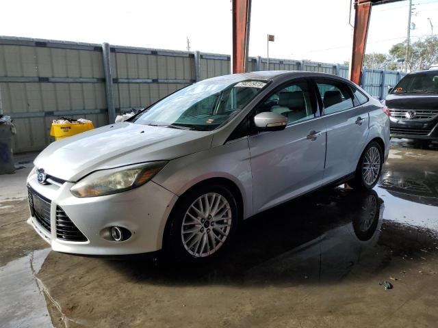 Image 1 of 2014 FORD FOCUS TITANIUM 2014 with VIN 1FADP3J23EL339071