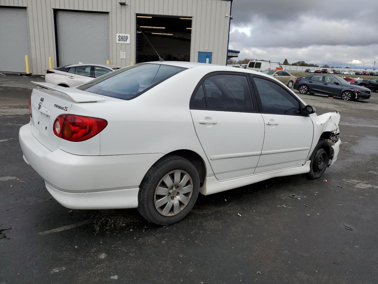Image 3 of 2003 TOYOTA COROLLA CE 2003 with VIN 1NXBR32E43Z104900