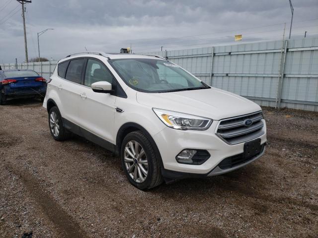 Image 1 of 2017 FORD ESCAPE TITANIUM 2017 with VIN 1FMCU9J98HUB80265