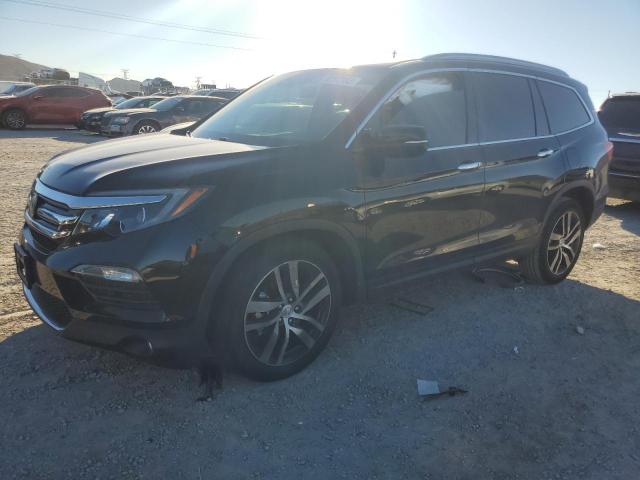 Obraz 1 z 2017 HONDA PILOT TOURING 2017 z VIN 5FNYF5H95HB004351