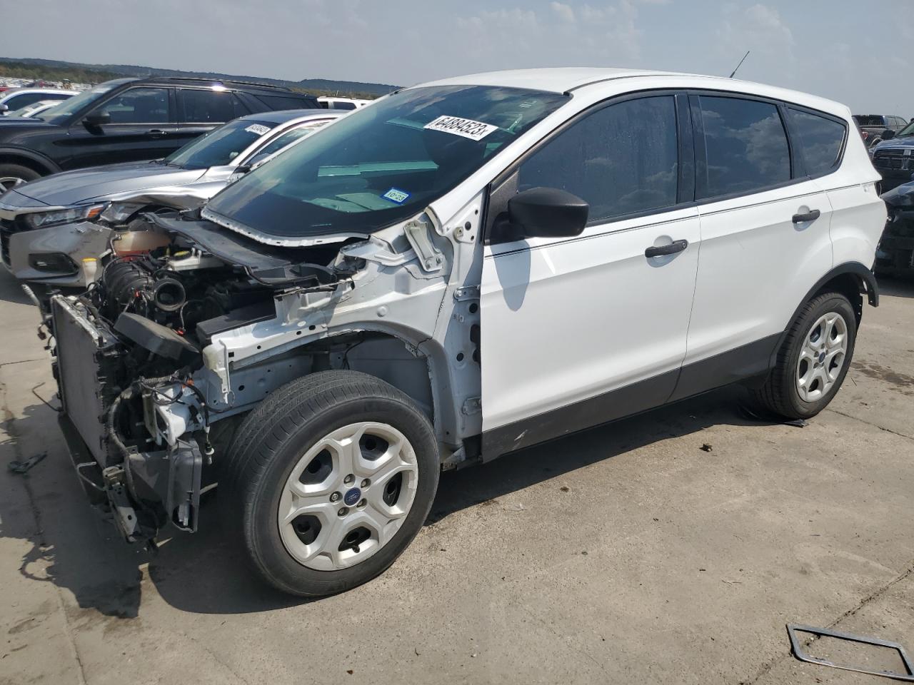 Obraz 1 z 2017 FORD ESCAPE S 2017 z VIN 1FMCU0F72HUC65198