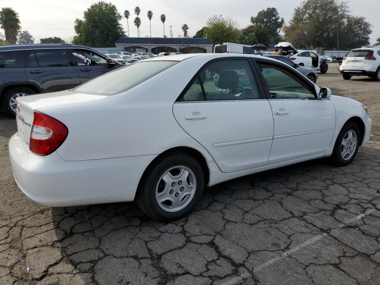 Obraz 3 z 2002 TOYOTA CAMRY LE 2002 z VIN 4T1BF32K82U007311