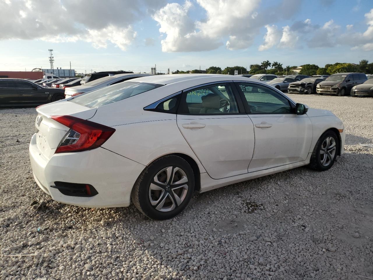Image 3 of 2018 HONDA CIVIC LX 2018 with VIN 19XFC2F55JE032953