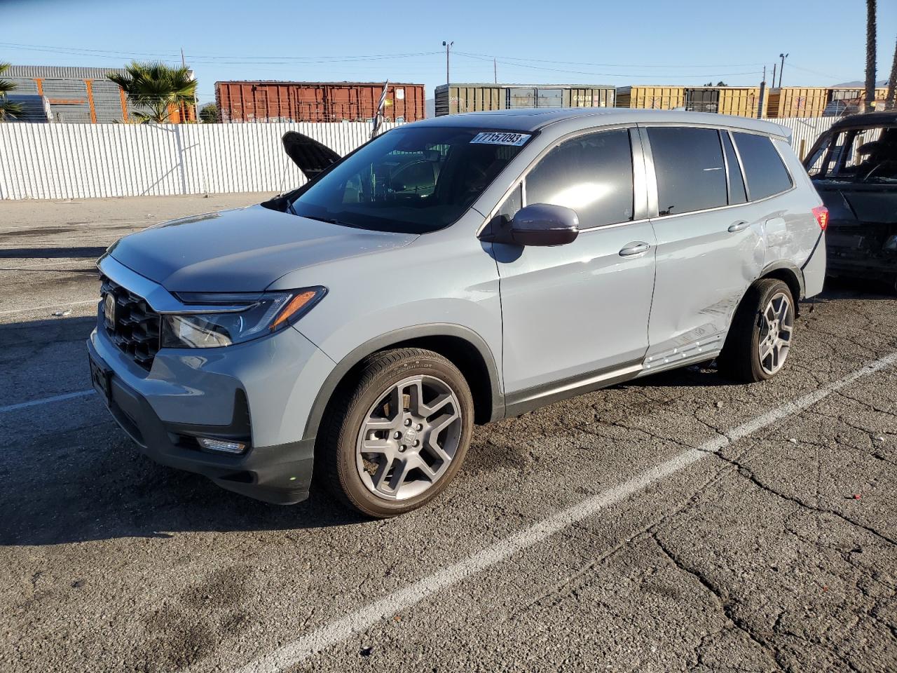Изображение 1 2022 HONDA PASSPORT EXL 2022 с VIN 5FNYF7H57NB001553