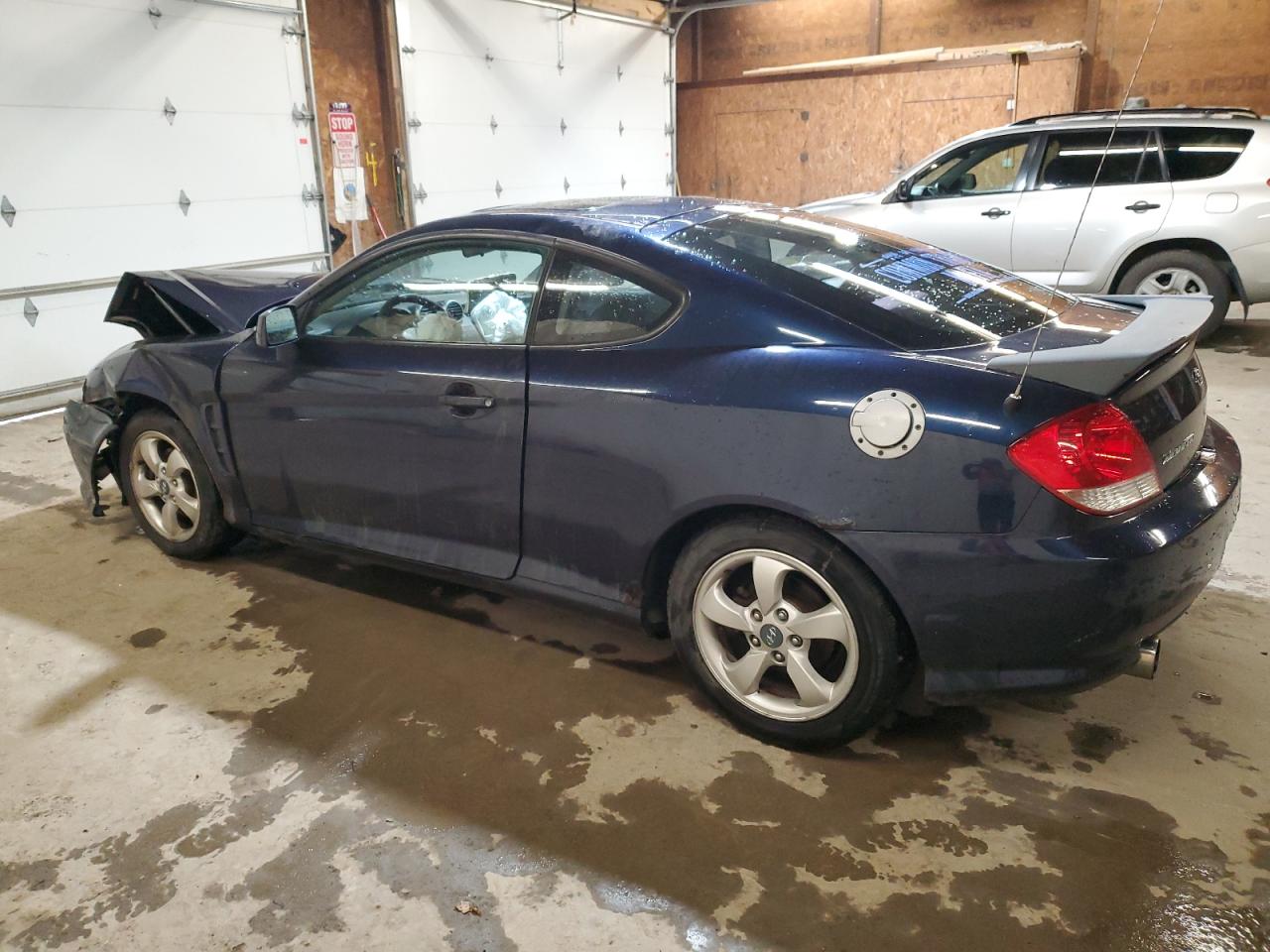 Obraz 2 z 2005 HYUNDAI TIBURON  2005 z VIN KMHHM65DX5U166396