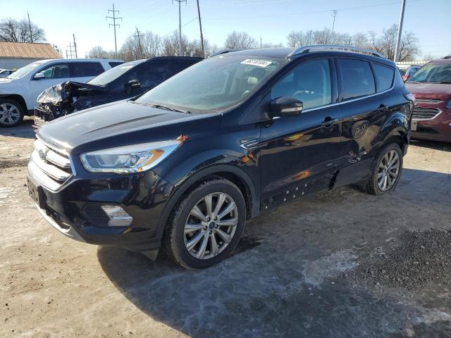 Image 1 of 2017 FORD ESCAPE TITANIUM 2017 with VIN 1FMCU9J93HUE90131