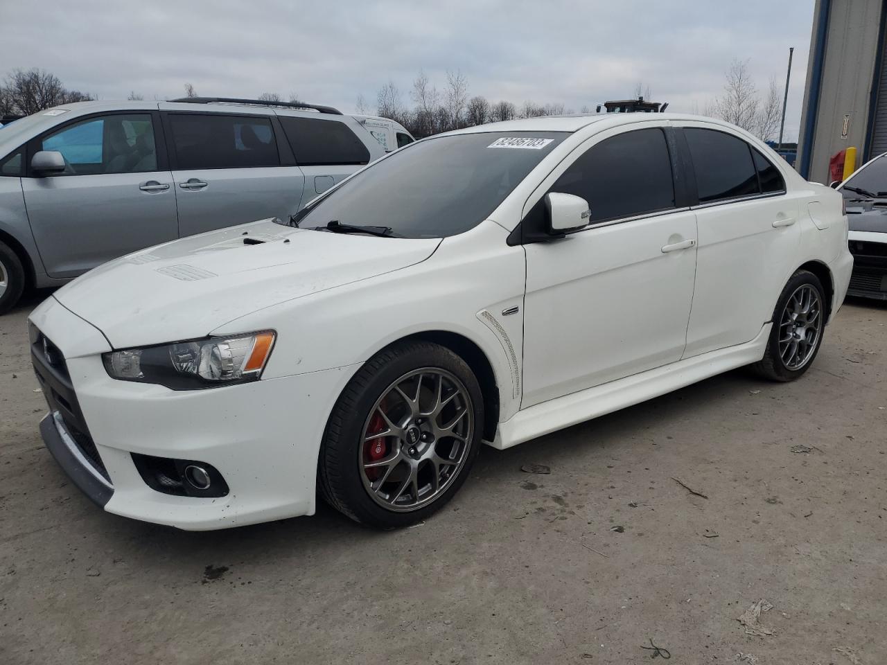 Obraz 1 z 2015 MITSUBISHI LANCER EVOLUTION MR 2015 z VIN JA32W5FVXFU008341