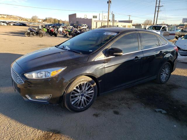 Image 1 of 2018 FORD FOCUS TITANIUM 2018 with VIN 1FADP3J27JL251778