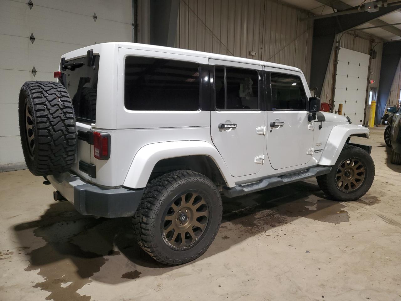 Image 3 of 2011 JEEP WRANGLER UNLIMITED SAHARA 2011 with VIN 1J4HA5H13BL610769