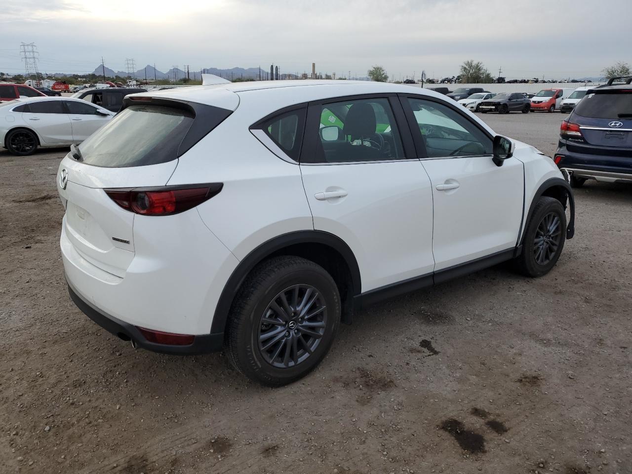 Image 3 of 2021 MAZDA CX-5 SPORT 2021 with VIN JM3KFABM7M0325884