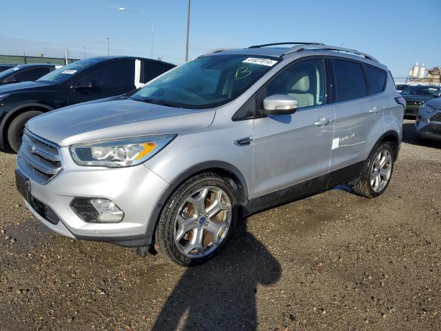 Image 1 of 2017 FORD ESCAPE TITANIUM 2017 with VIN 1FMCU0J91HUA50842
