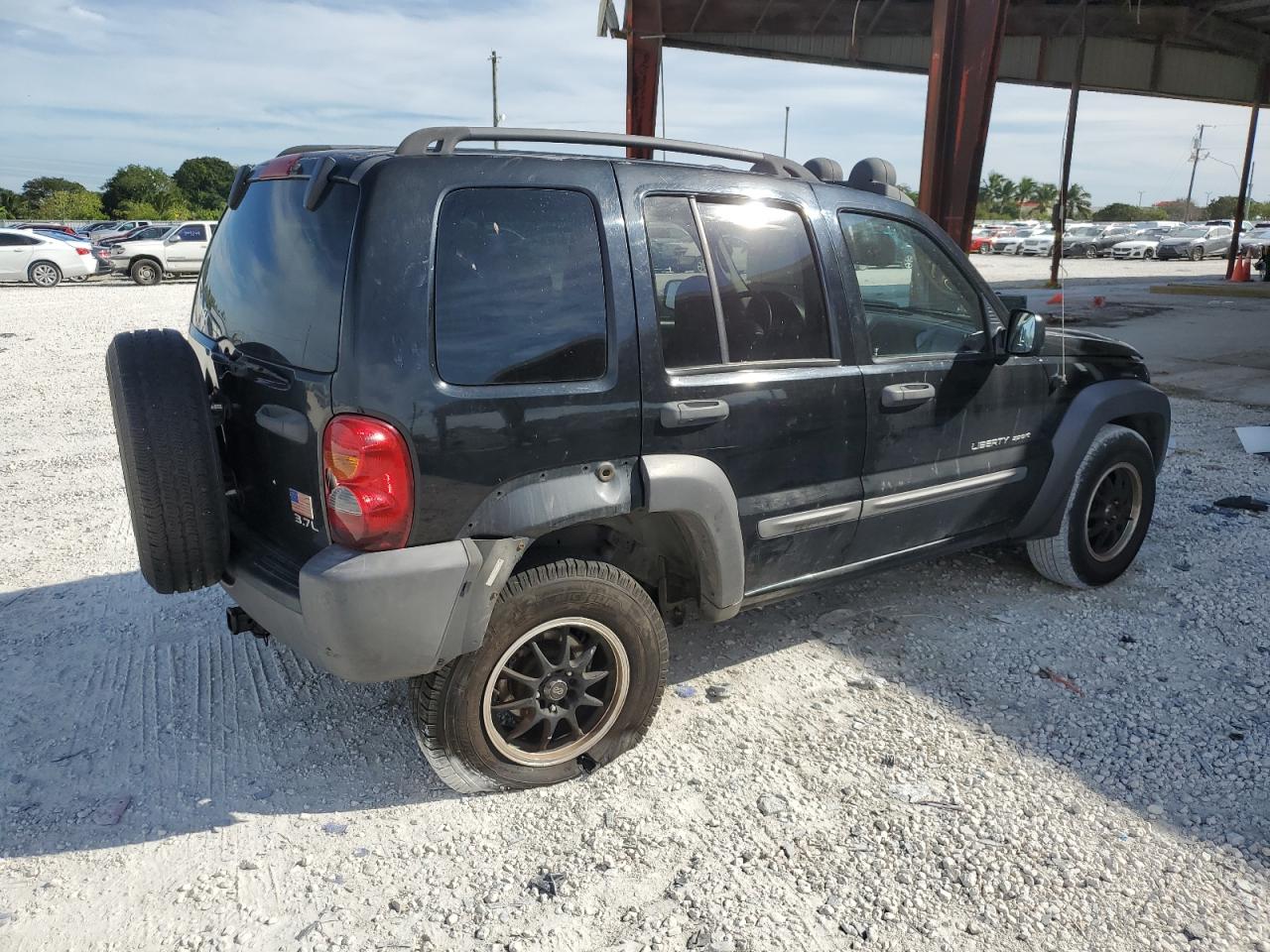 Image 3 of 2003 JEEP LIBERTY SPORT 2003 with VIN 1J4GL48K93W527503
