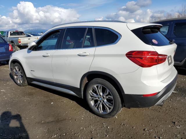 Изображение 2 2016 BMW X1 XDRIVE28I 2016 с VIN WBXHT3Z38G4A48251