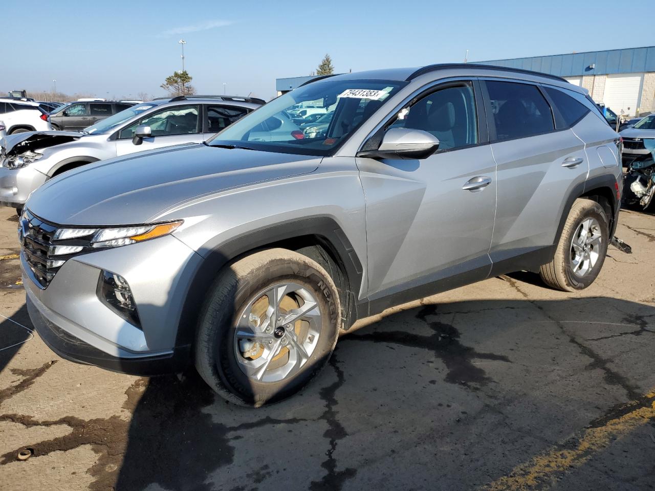 Image 1 of 2022 HYUNDAI TUCSON SEL 2022 with VIN 5NMJBCAE4NH037666