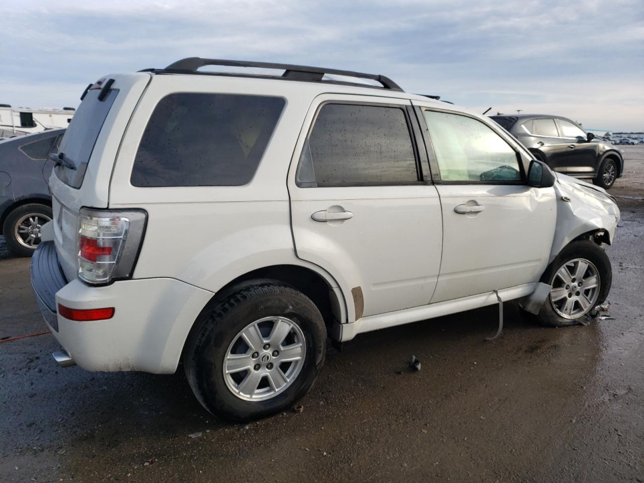 Image 3 of Mercury Mariner 2009 with VIN 4M2CU81G29KJ17666