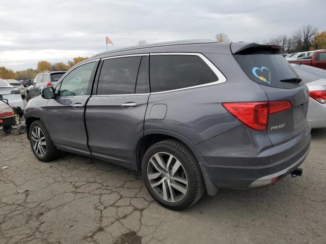 Изображение 2 2018 HONDA PILOT TOURING 2018 с VIN 5FNYF6H92JB051316