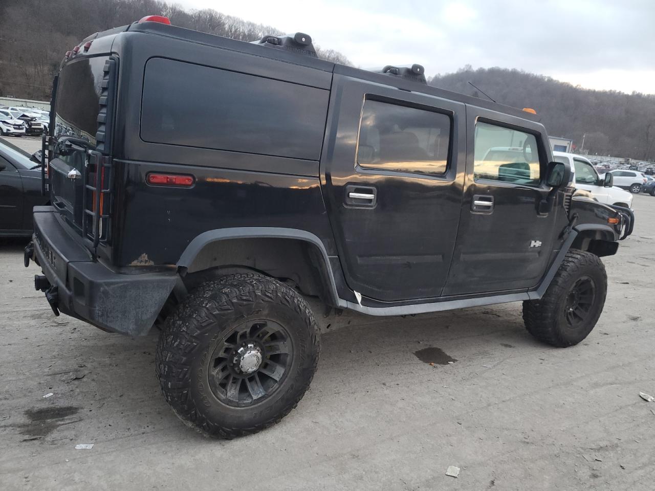 Image 3 of 2003 HUMMER H2  2003 with VIN 5GRGN23U23H127752