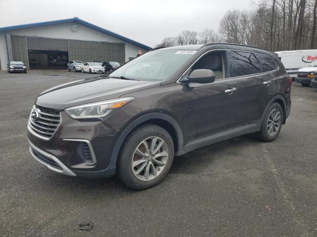Image 1 of 2017 HYUNDAI SANTA FE SE 2017 with VIN KM8SM4HFXHU223899