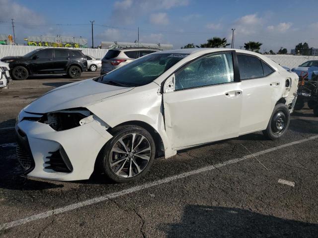 Image 1 of 2018 TOYOTA COROLLA L 2018 with VIN 5YFBURHEXJP780193