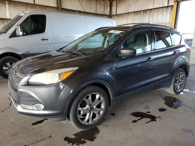 Obraz 1 z 2015 FORD ESCAPE SE 2015 z VIN 1FMCU0GX0FUB93655