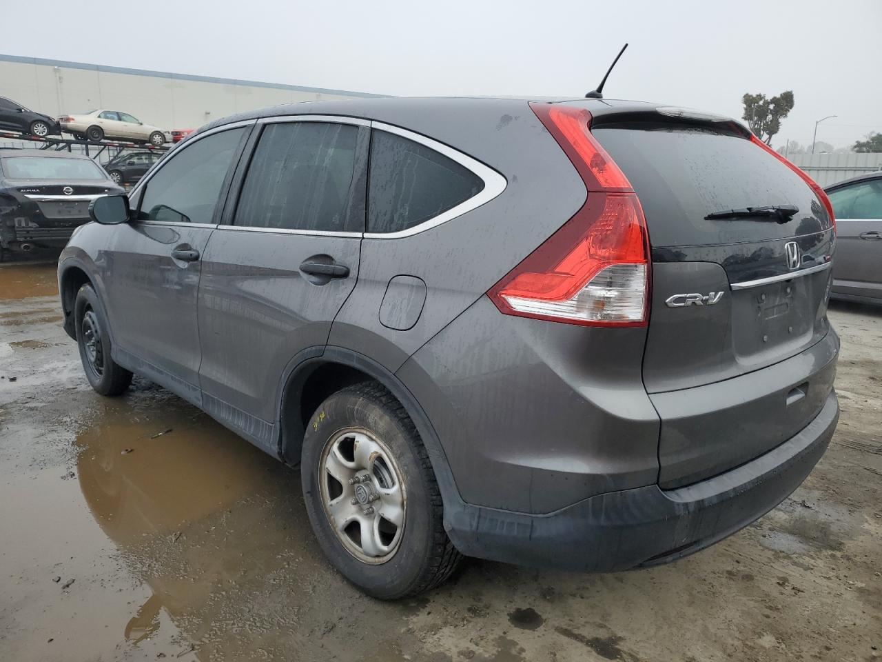 Изображение 2 2014 HONDA CR-V LX 2014 с VIN 2HKRM3H39EH542011