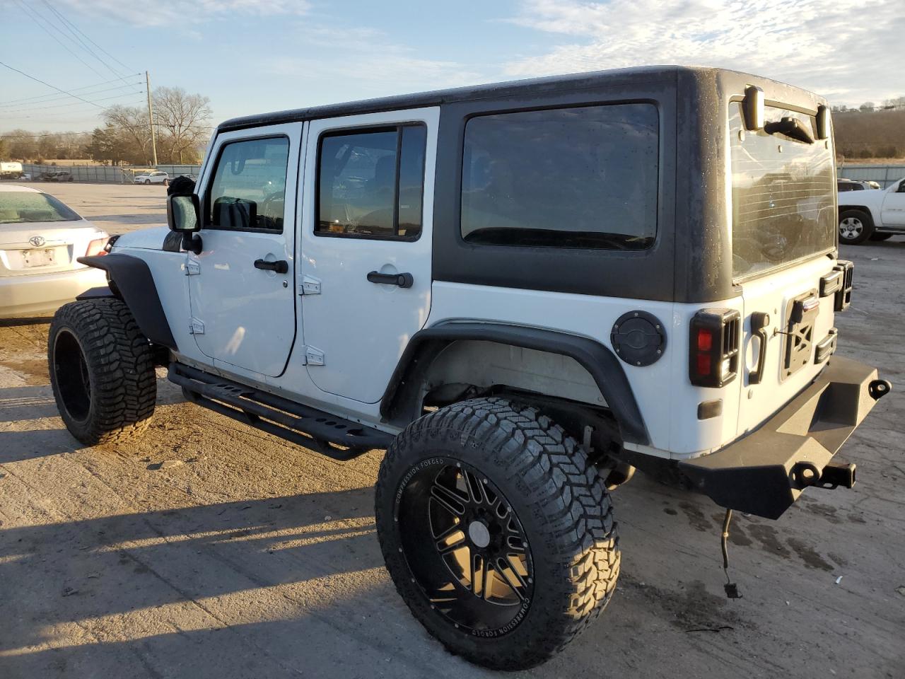 Изображение 2 2016 JEEP WRANGLER UNLIMITED SPORT 2016 с VIN 1C4BJWDG7GL239036