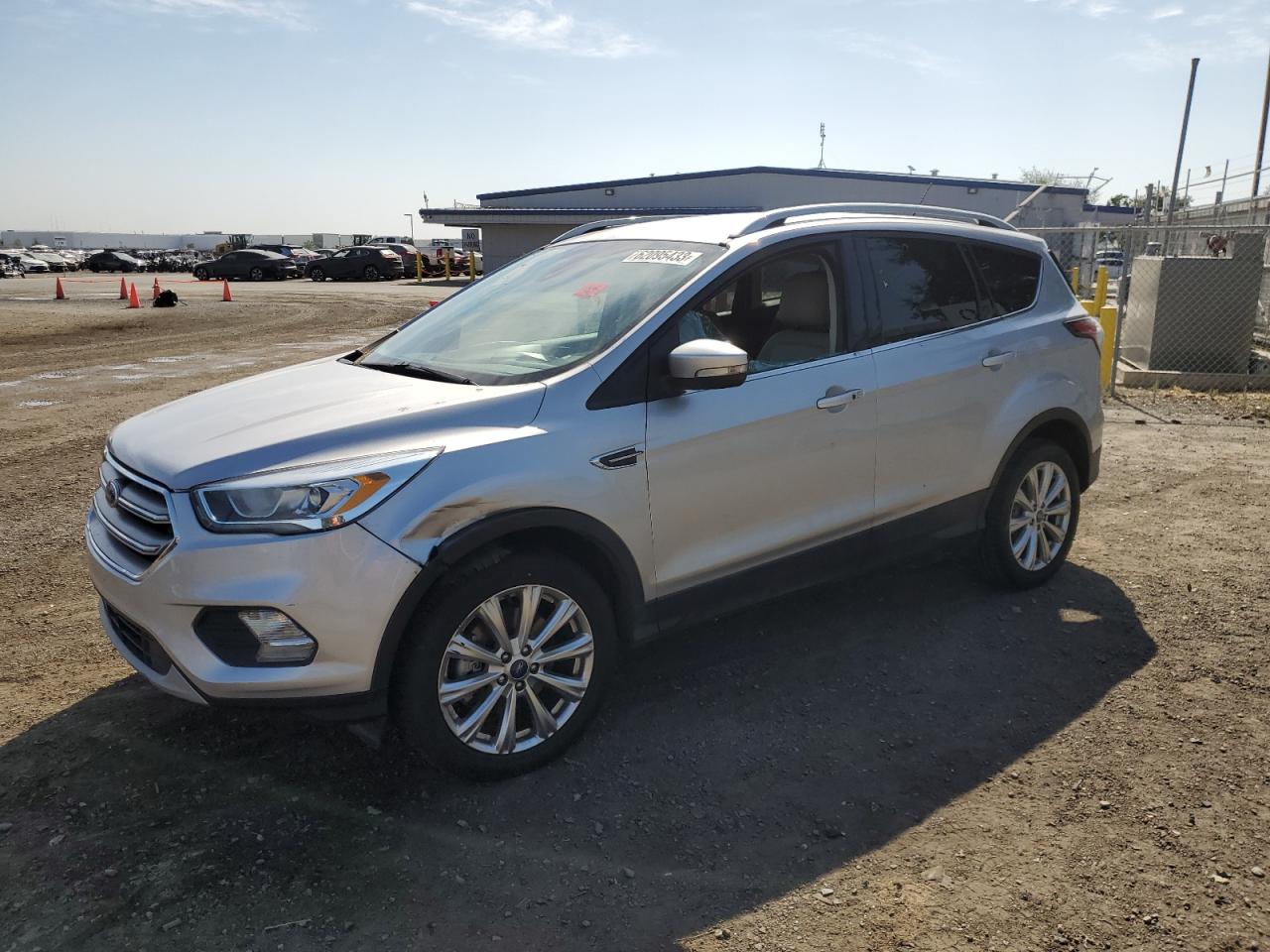 Image 1 of 2017 FORD ESCAPE TITANIUM 2017 with VIN 1FMCU9J92HUA64995