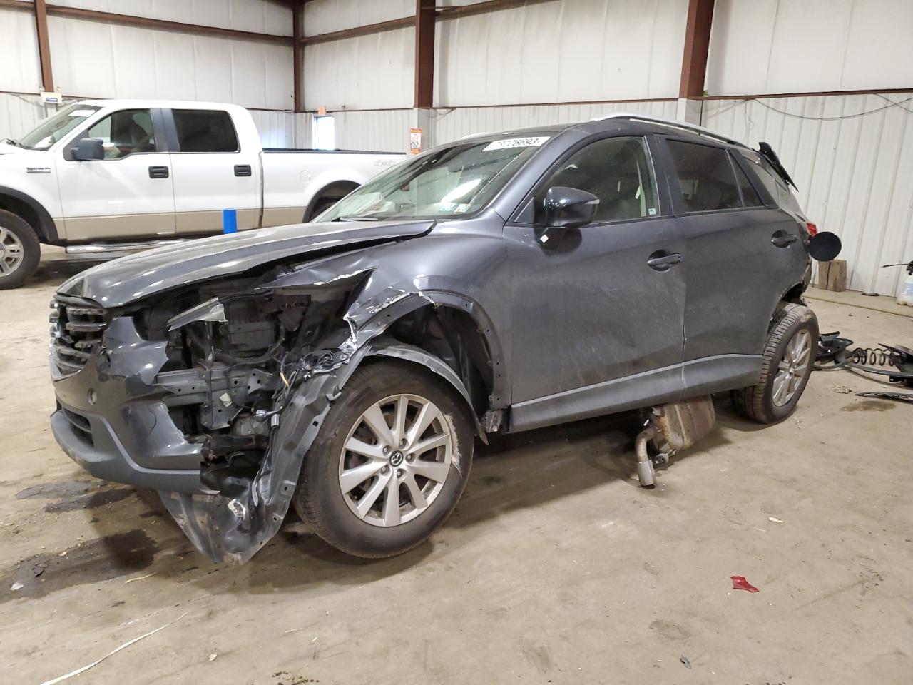 Obraz 1 z 2016 MAZDA CX-5 TOURING 2016 z VIN JM3KE2CY3G0607969
