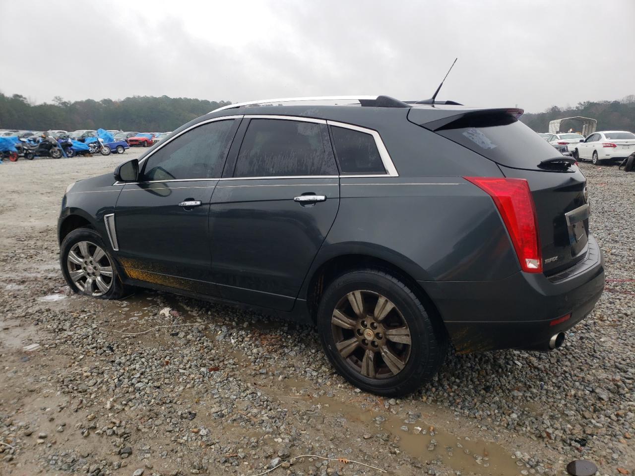 Изображение 2 2014 CADILLAC SRX LUXURY COLLECTION 2014 с VIN 3GYFNBE39ES663426