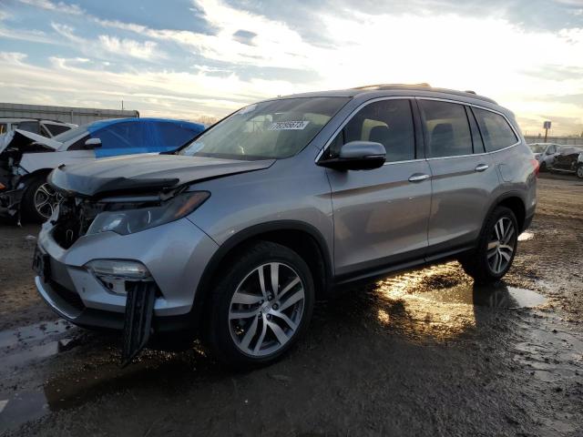 Obraz 1 z 2017 HONDA PILOT TOURING 2017 z VIN 5FNYF6H96HB063673