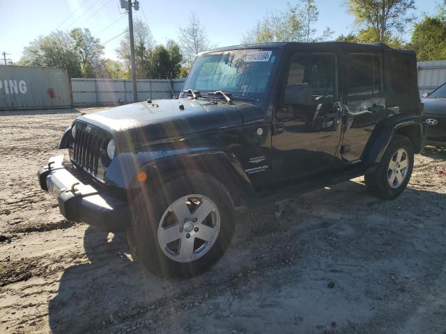 Image 1 of 2010 JEEP WRANGLER UNLIMITED SAHARA 2010 with VIN 1J4BA5H13AL224955