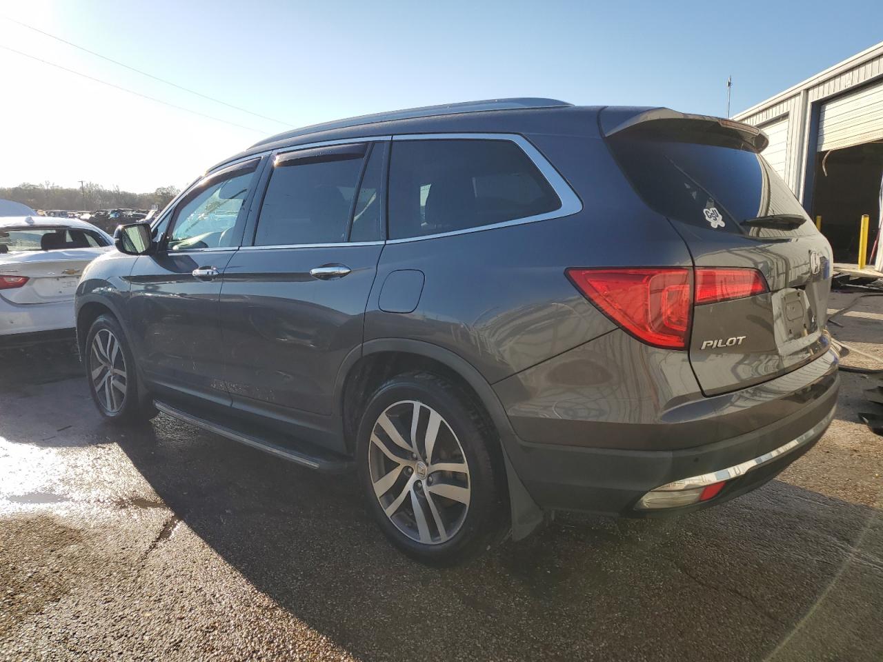 Image 2 of 2017 HONDA PILOT TOURING 2017 with VIN 5FNYF5H97HB044799