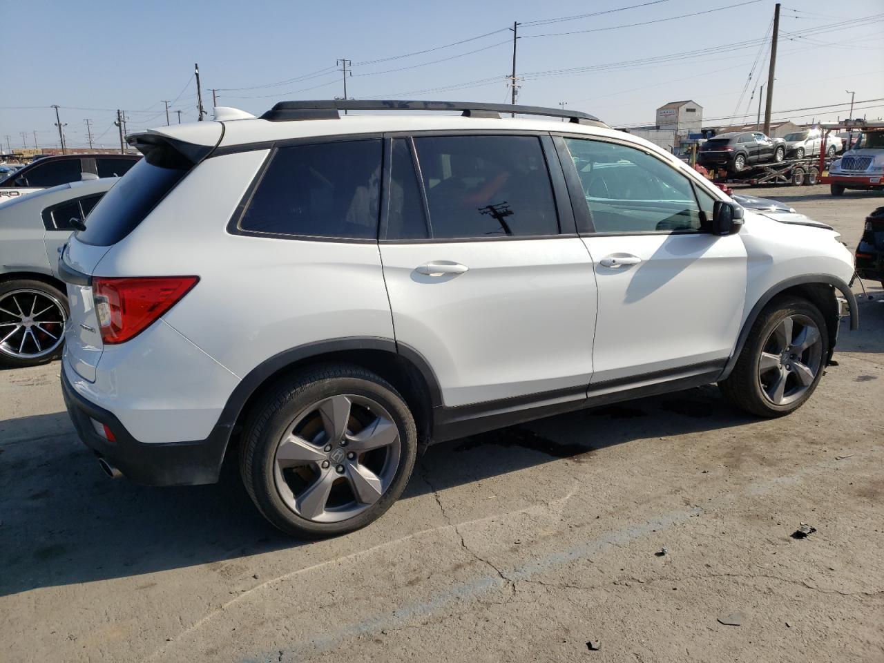 Obraz 3 z Honda Passport Touring 2021 z VIN 5FNYF7H96MB005367