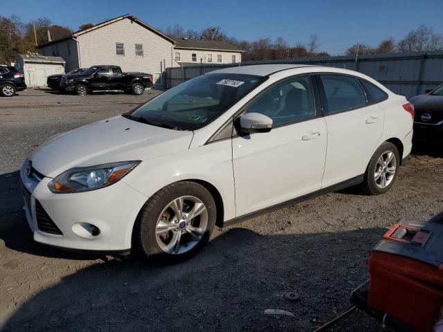 Image 1 of 2014 FORD FOCUS SE 2014 with VIN 1FADP3F2XEL338671