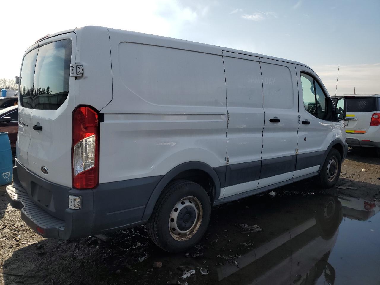 Image 3 of 2015 FORD TRANSIT T-150 2015 with VIN 1FTYE1ZM5FKA29149