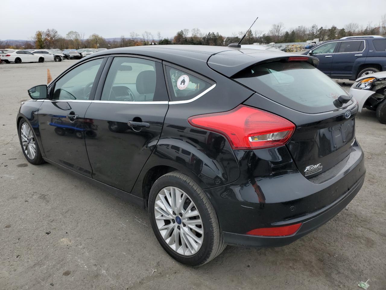 Image 2 of 2017 FORD FOCUS TITANIUM 2017 with VIN 1FADP3N23HL333771