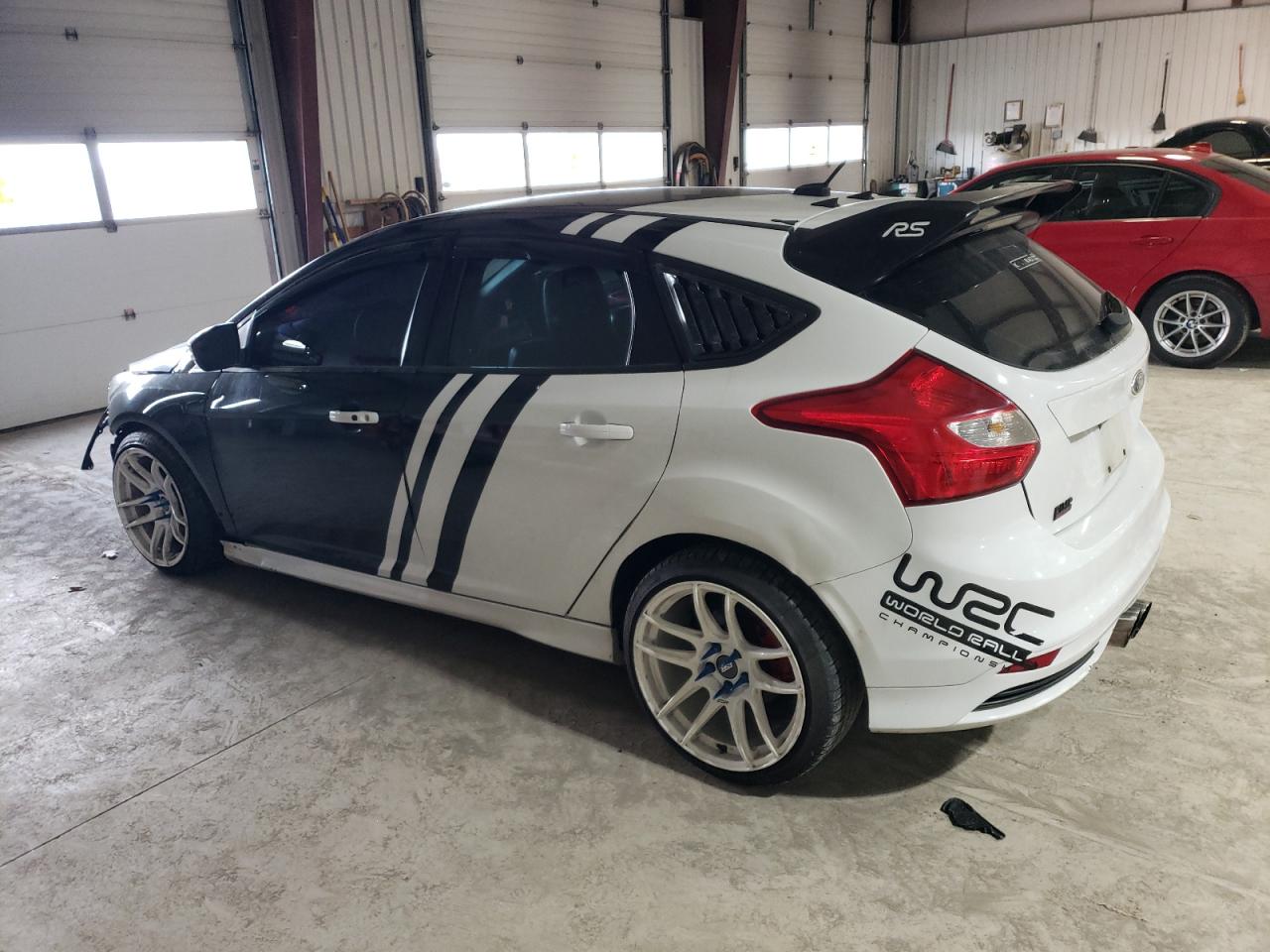 Image 2 of 2013 FORD FOCUS ST 2013 with VIN 1FADP3L9XDL201830