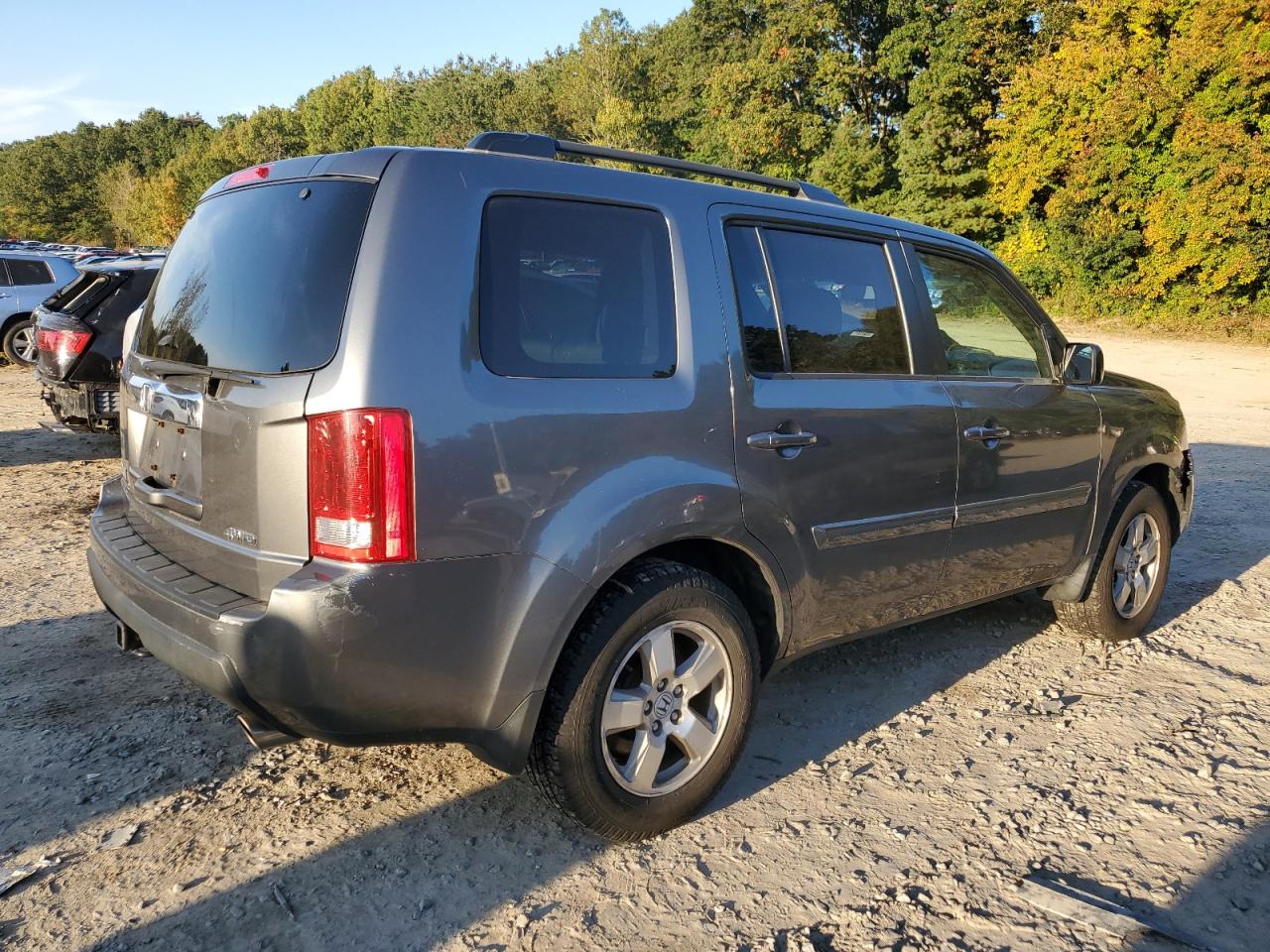 Изображение 3 Honda Pilot Exln 2011 с VIN 5FNYF4H70BB060374
