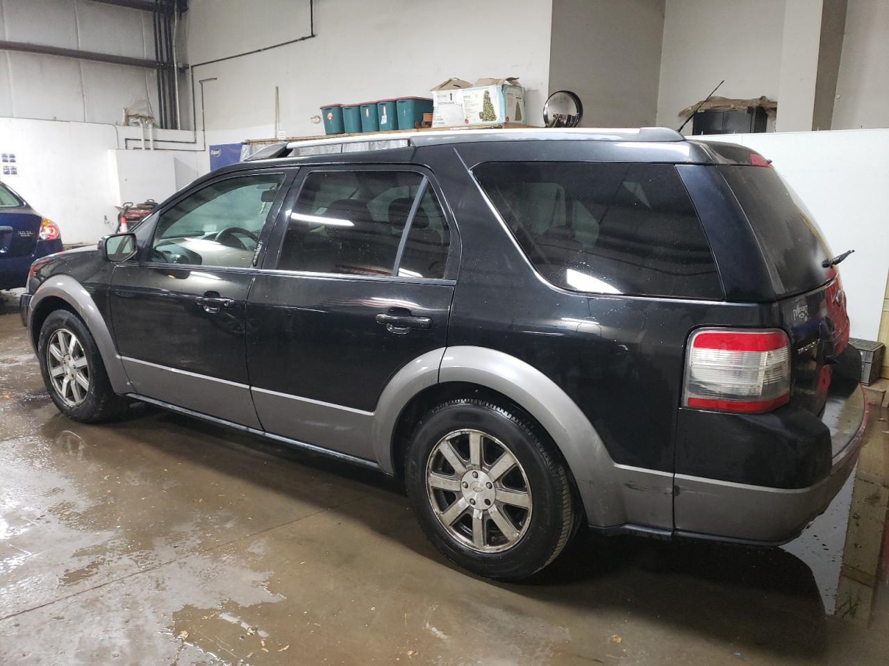 Image 2 of 2009 FORD TAURUS X SEL 2009 with VIN 1FMDK02WX9GA04926