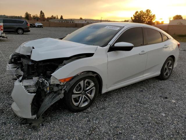 Изображение 1 2019 HONDA CIVIC LX 2019 с VIN 19XFC2F61KE203353