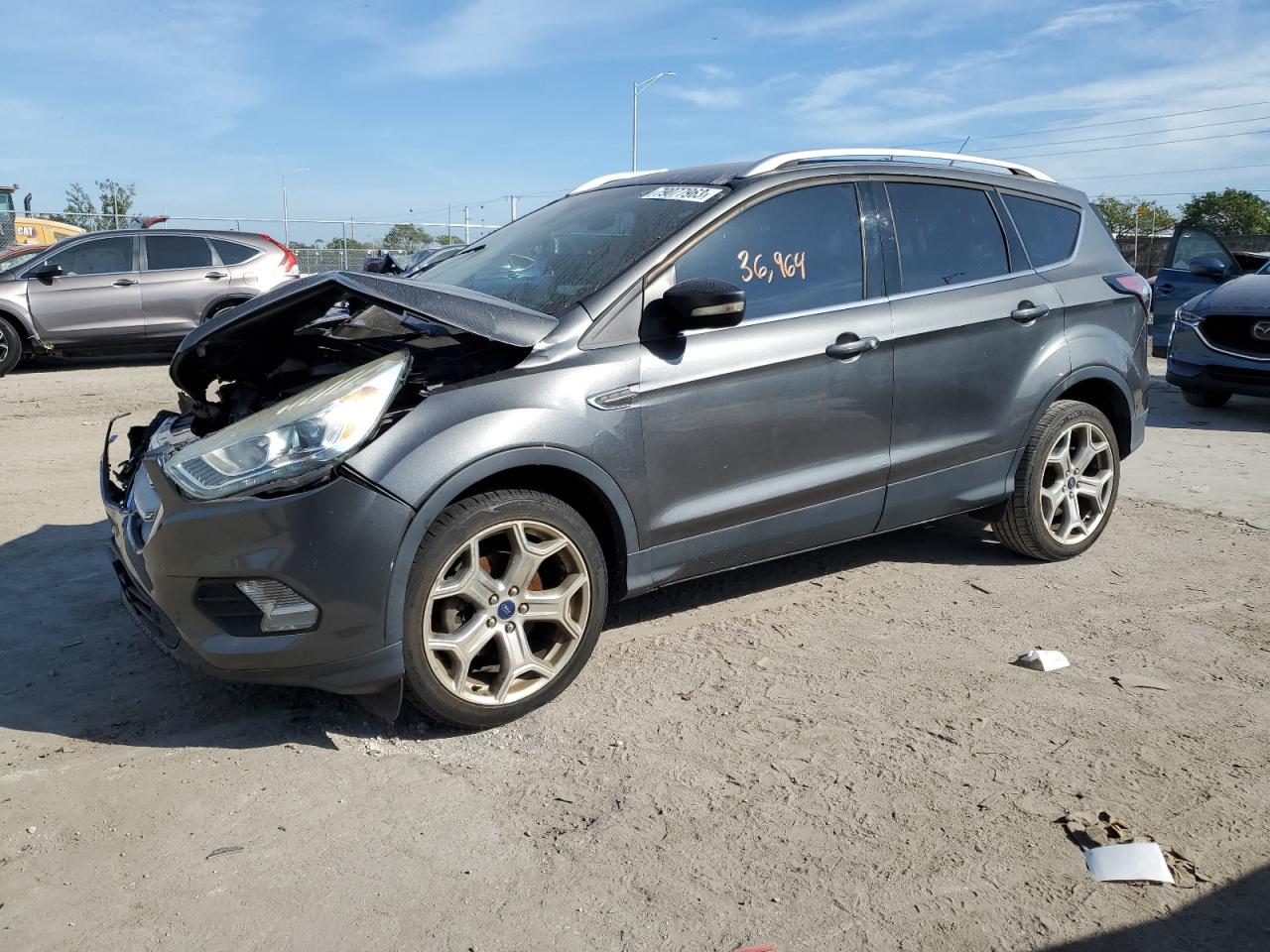 Image 1 of 2017 FORD ESCAPE TITANIUM 2017 with VIN 1FMCU0JD9HUA31444