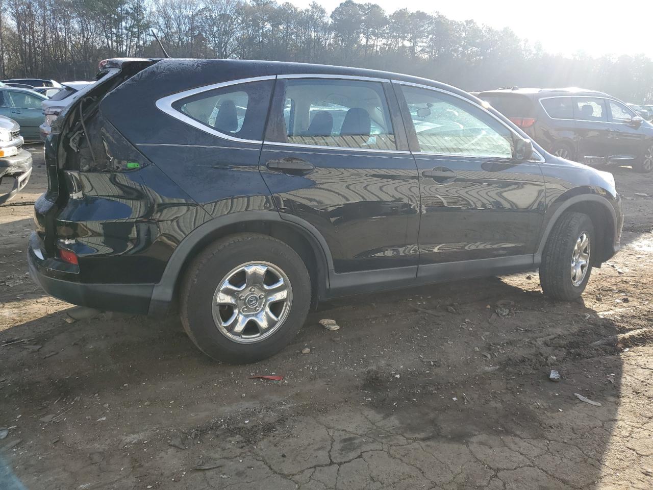Obraz 3 z 2015 HONDA CR-V LX 2015 z VIN 3CZRM3H32FG702881