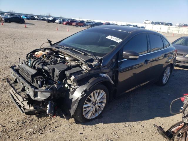 Image 1 of 2018 FORD FOCUS TITANIUM 2018 with VIN 1FADP3J21JL320741