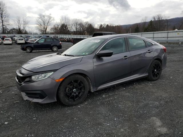 Image 1 of 2018 HONDA CIVIC LX 2018 with VIN 19XFC2E56JE002927