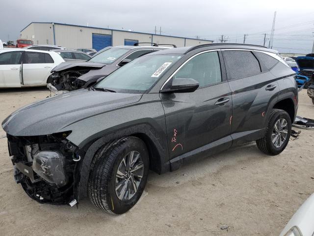 Image 1 of 2022 HYUNDAI TUCSON BLUE 2022 with VIN KM8JBCA1XNU021070