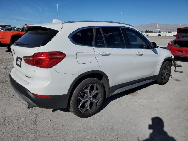 Obraz 3 z 2018 BMW X1 SDRIVE28I 2018 z VIN WBXHU7C38J5L06733