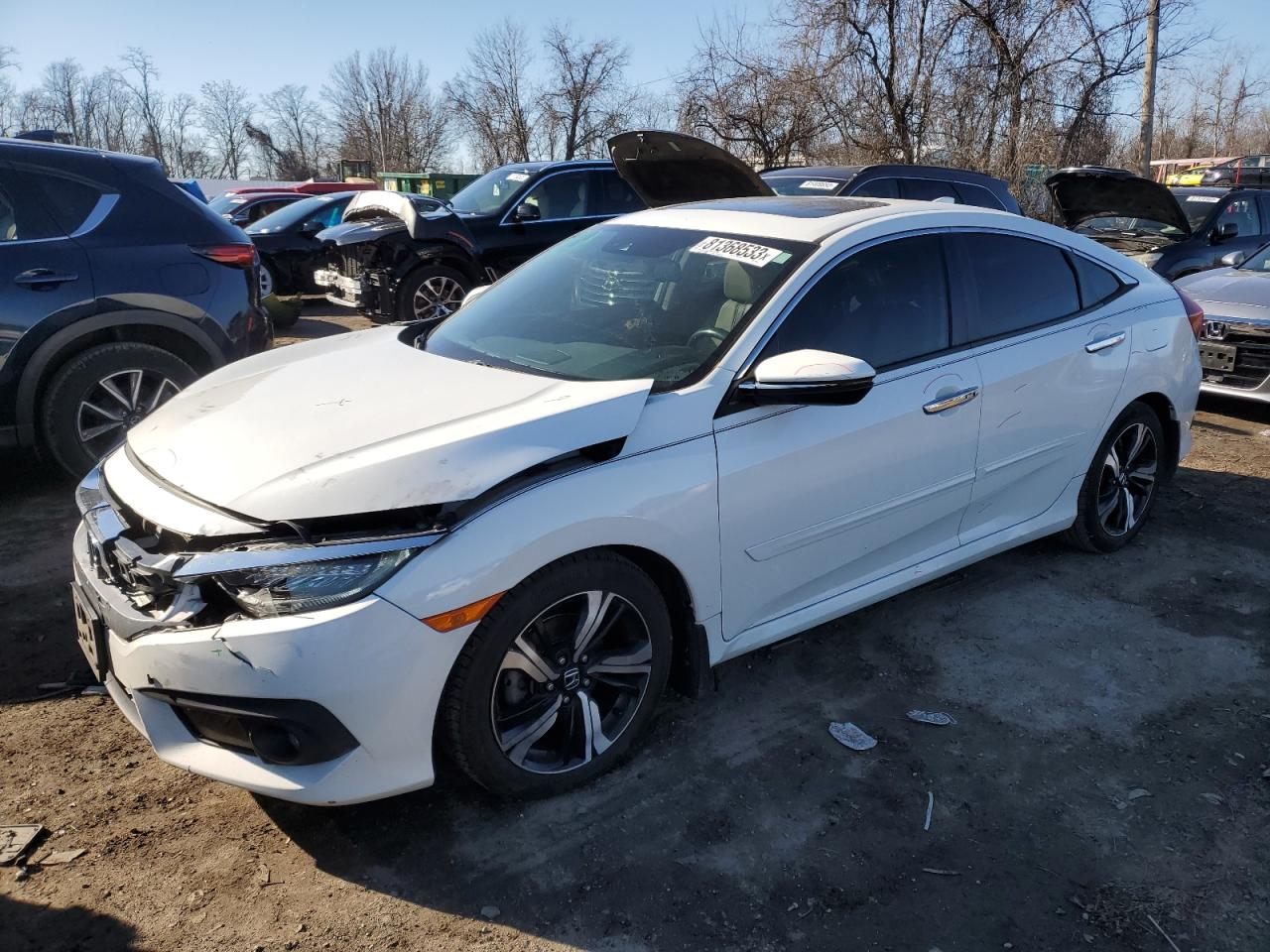 Obraz 1 z 2016 HONDA CIVIC TOURING 2016 z VIN 2HGFC1F99GH635657